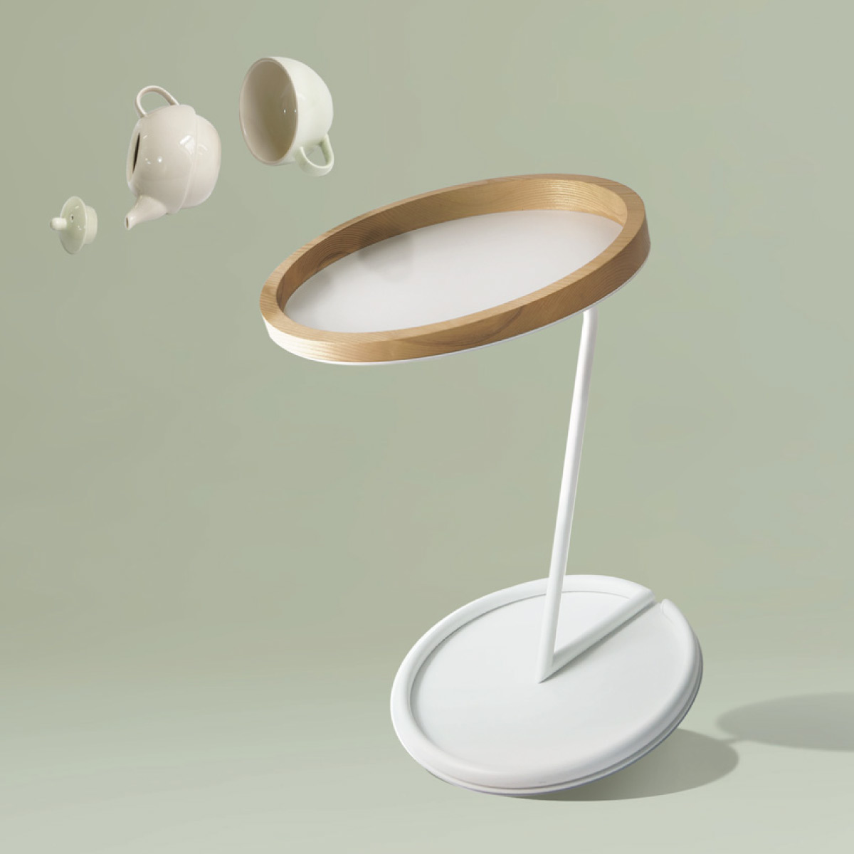 Obelia side table with a teapot and cup falling off the table